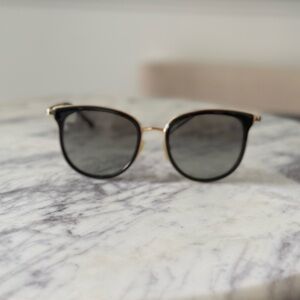 Michael Kors MK1010 Adrianna I
 Black Sunglasses with Gold Frame